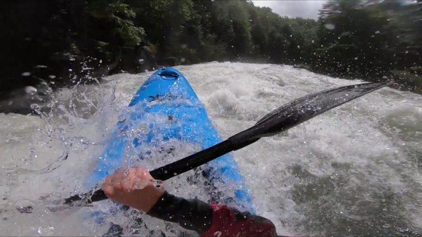 Kayaking down a flooded river Puesco river at insane flows highest descent